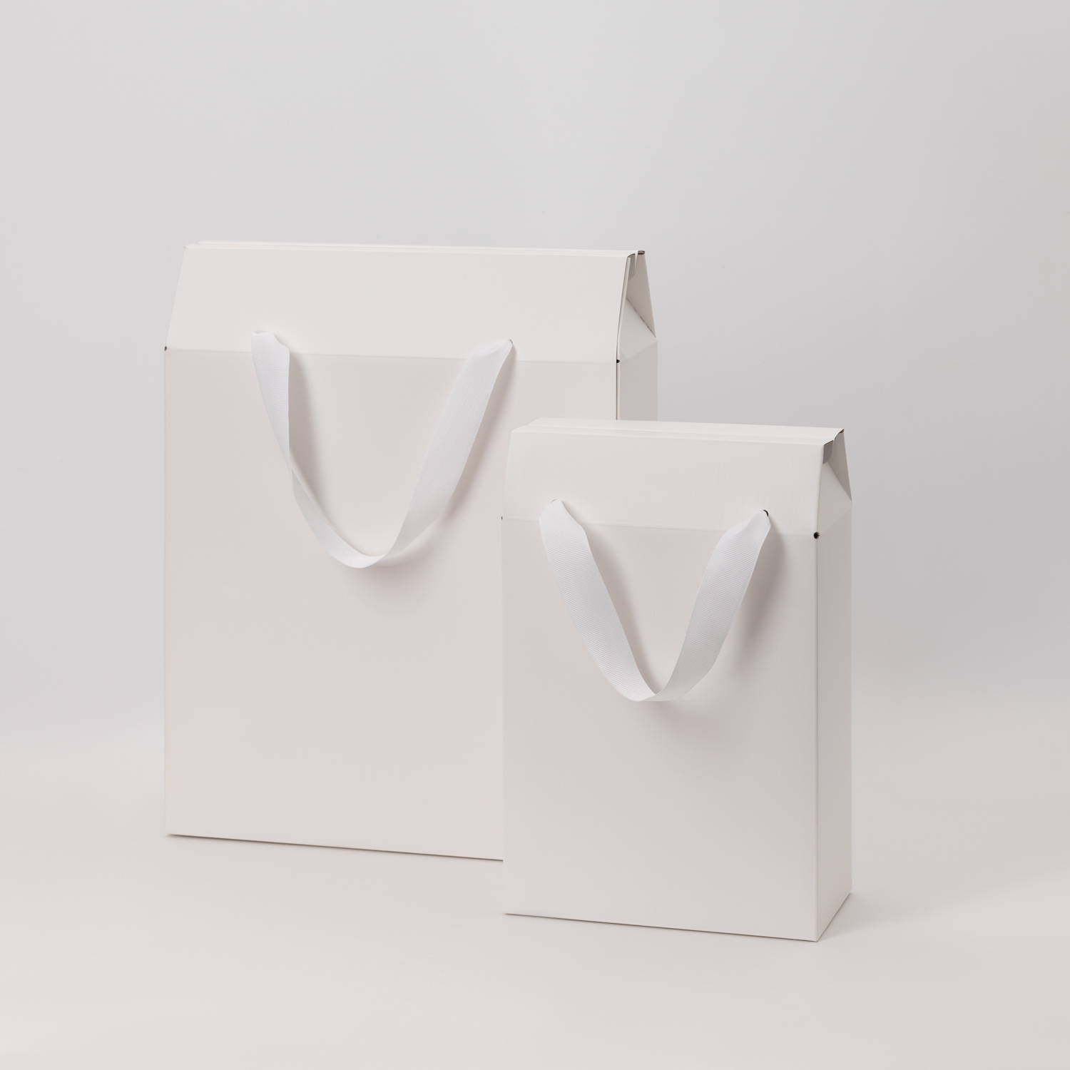 Подарочная коробка-пакет универсальная большая, белая-3